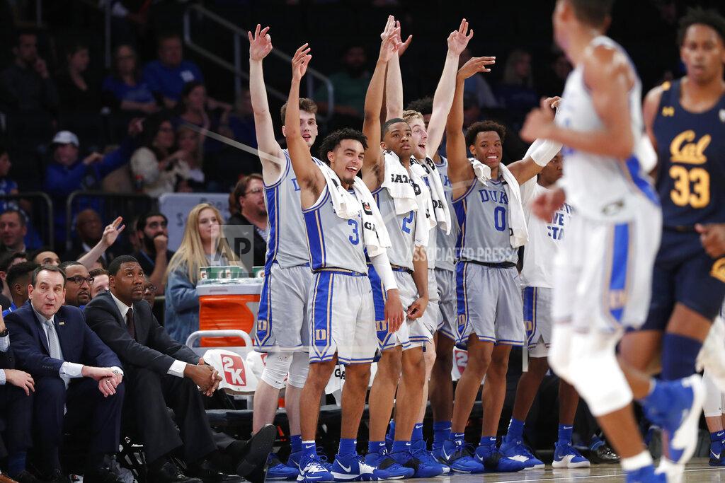 Kathy Willens Duke starters react to a play as they watch from the bench late in the second half of the team's NCAA college basketball game against California in the 2K Empire Classic, Thursday, Nov. 21, 2019, in New York. Duke defeated California 87-52. (AP Photo/Kathy Willens)