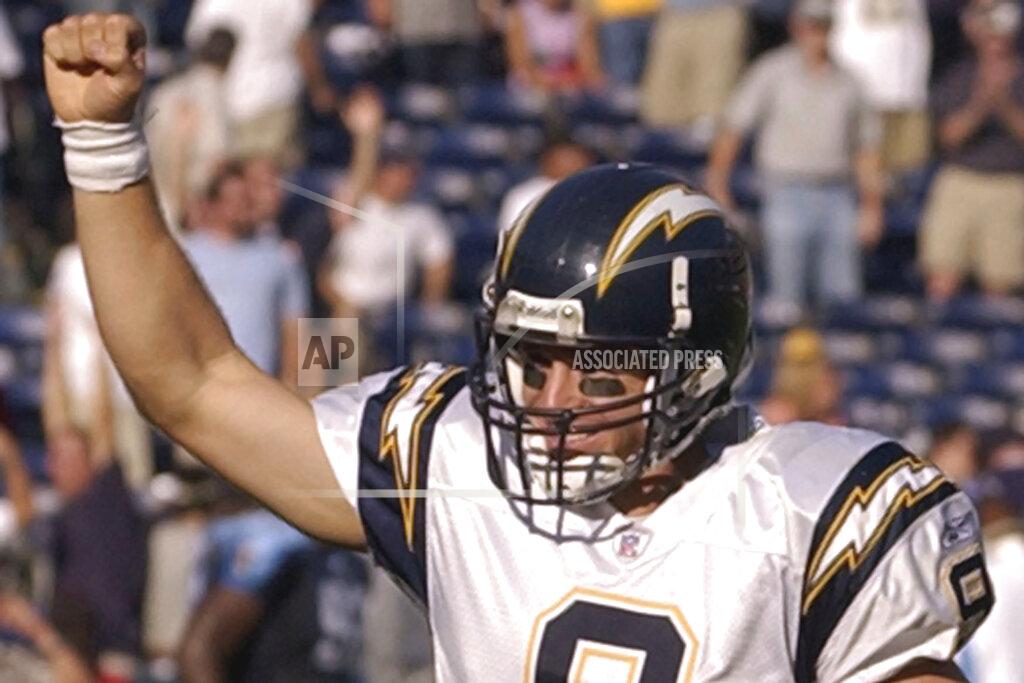 Denis Poroy FILE - In this Oct. 3, 2004, file photo, then-San Diego Chargers quarterback Drew Brees pumps his fist as the Chargers score another touchdown in the fourth quarter of their 38-17 victory over the Tennessee Titans, in San Diego. Saints quarterback Drew Brees is about to look across the line of scrimmage at uniforms emblazoned with the lightning bolt logo of the team that drafted him. It could be the final time the 41-year-old Brees plays against the Chargers. (AP Photo/Denis Poroy)