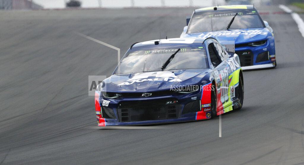 John Munson Alex Bowman heads into Turn 1 during a practice run for the NASCAR Cup Series auto race at Watkins Glen International, Saturday, Aug. 3, 2019, in Watkins Glen, N.Y. (AP Photo/John Munson)