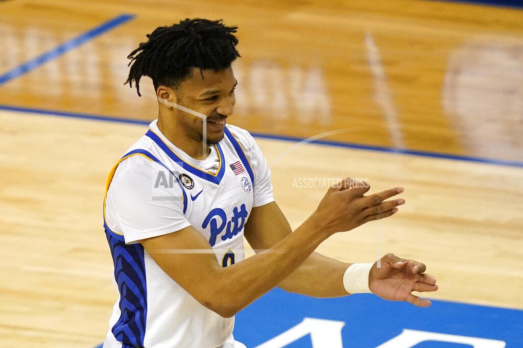Gerry Broome Pittsburgh guard Ithiel Horton (0) reacts after sinking a three pointer during the second half an NCAA college basketball game in the first round of the Atlantic Coast Conference tournament in Greensboro, N.C., Tuesday, March 9, 2021. (AP Photo/Gerry Broome)