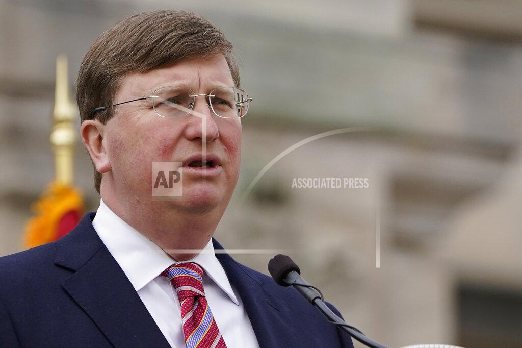FILE - Mississippi Gov. Tate Reeves delivers his State of the State speech on Tuesday, Jan. 26, 2021, in Jackson, Miss. Congress just sweetened the incentives for states to extend Medicaid insurance coverage to more low-income adults, but the dozen Republican-controlled states that have spent years resisting expanding the programs have no plans to change course now. Gov. Reeves says he's not going for it, noting that his stance was a major issue in his 2019 campaign. His GOP primary opponents supported a plan to expand, with the state's share being paid for by hospitals and a fee of up to $20 a month for people who signed up. He opposed it, even as the Mississippi Hospital Association said it could bring up to 19,000 jobs to the state. (AP Photo/Rogelio V. Solis, file)