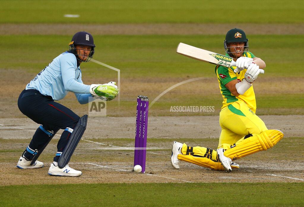 Jason Cairnduff Australia's David Warner, right, plays a shot during the third ODI cricket match between England and Australia, at Old Trafford in Manchester, England, Wednesday, Sept. 16, 2020. (Jason Cairnduff/Pool via AP)
