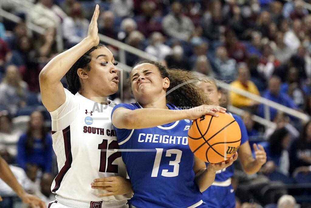 Gerry Broome South Carolina guard Brea Beal (12) defends against Creighton guard Rachael Saunders (13) during the first half of a college basketball game in the Elite 8 round of the NCAA tournament in Greensboro, N.C., Sunday, March 27, 2022. (AP Photo/Gerry Broome)