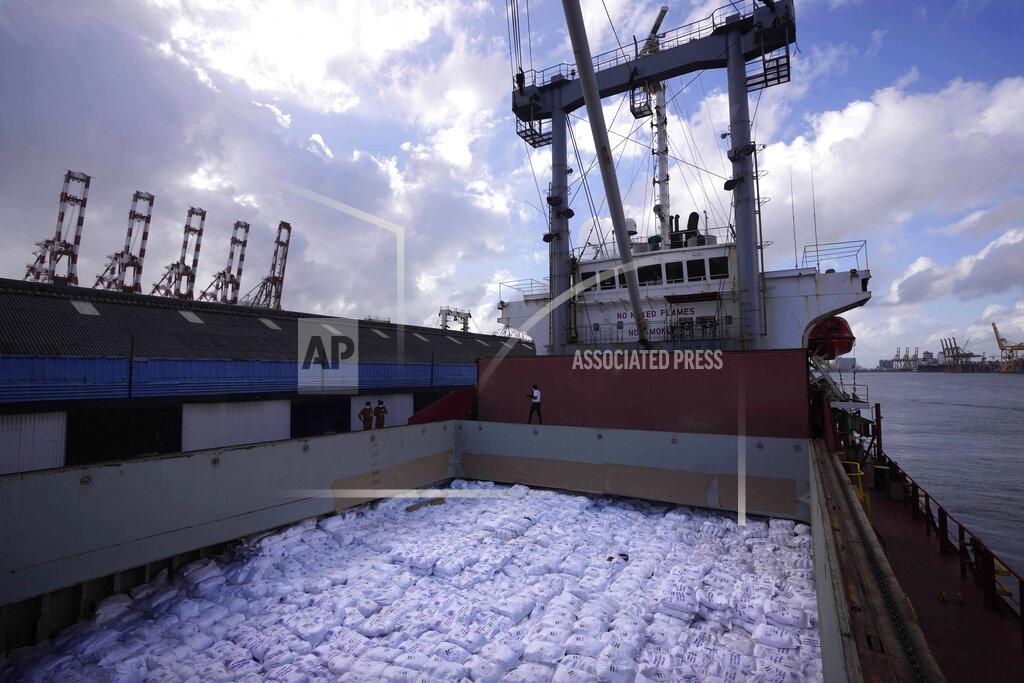 Eranga Jayawardena A cargo ship carrying humanitarian aid by Indian government for Sri Lankan people arrives at a port in Colombo, Sri Lanka, Sunday, May 22, 2022. The consignment, which consists of 9,000 MT of rice, 50 MT of milk powder and more than 25 MT of drugs and other medical supplies. (AP Photo/Eranga Jayawardena)