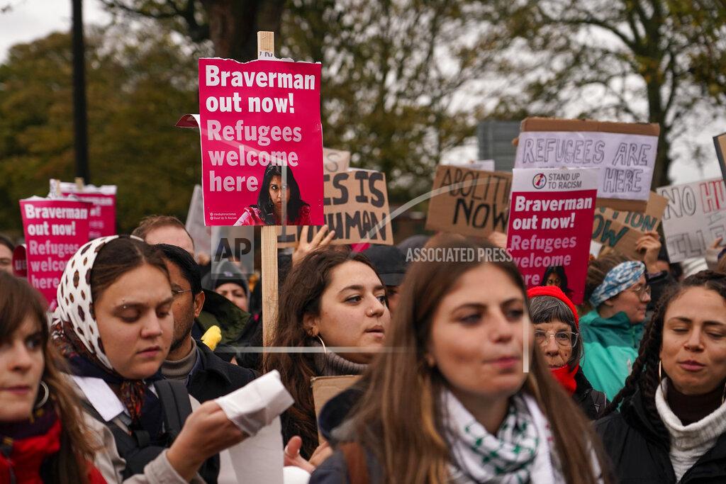 Alberto Pezzali FILE - Demonstrators hold placards as they take part to a protest outside the Manston immigration short-term holding facility near Thanet, England, Nov. 6, 2022. In his first month as Britain's prime minister, Rishi Sunak has stabilized the economy, reassured allies from Washington to Kyiv and even soothed the European Union after years of sparring between Britain and the bloc. But Sunak’s challenges are just beginning. He is facing a stagnating economy, a cost-of-living crisis – and a Conservative Party that is fractious and increasingly unpopular after 12 years in power. (AP Photo Alberto Pezzali, File)