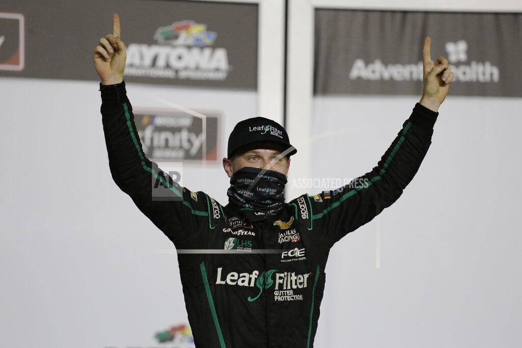 Terry Renna Justin Haley celebrates in Victory Lane after winning a NASCAR Xfinity auto race at Daytona International Speedway, Friday, Aug. 28, 2020, in Daytona Beach, Fla. (AP Photo/Terry Renna)