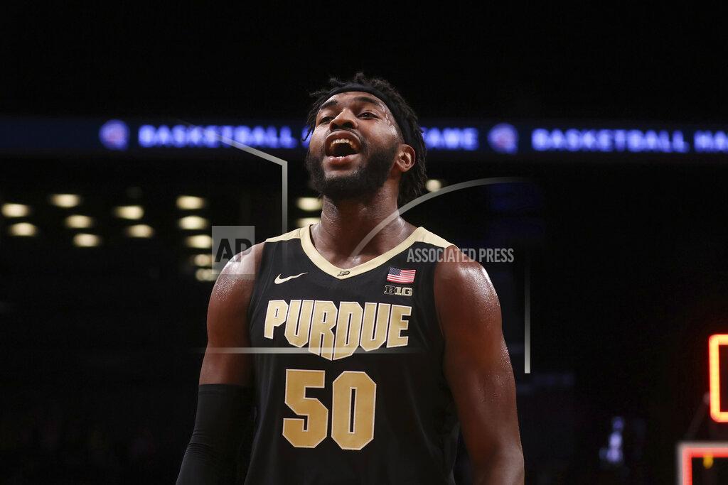 Jason Decrow Purdue's Trevion Williams (50) reacts after his team's overtime victory over North Carolina State in an NCAA college basketball game Sunday, Dec. 12, 2021, in New York. (AP Photo/Jason DeCrow)