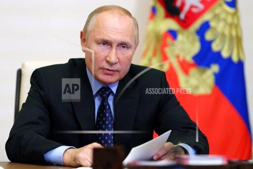 Russian President Vladimir Putin chairs a meeting on development of the resource potential on the Yamal peninsula via teleconference at the Novo-Ogaryovo residence outside Moscow, Russia, Wednesday, Oct. 27, 2021. (Evgeny Paulin, Sputnik, Kremlin Pool Photo via AP)