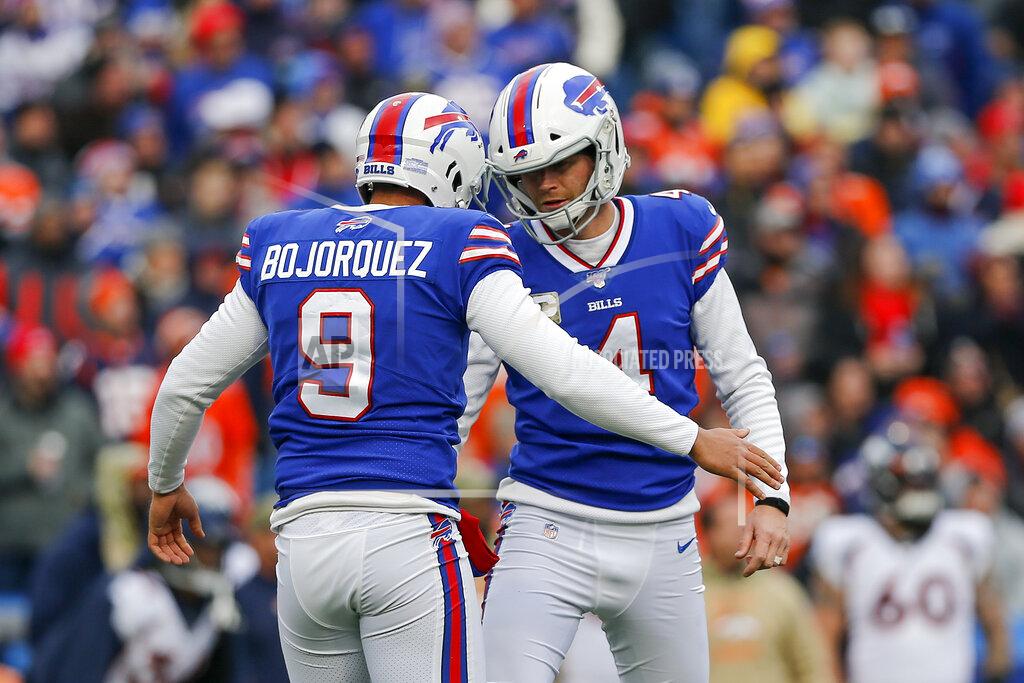 John Munson Buffalo Bills kicker Stephen Hauschka (4) celebrates with punter Corey Bojorquez (9) after kicking a field goal against the Denver Broncos during the first quarter of an NFL football game, Sunday, Nov. 24, 2019, in Orchard Park, N.Y. (AP Photo/John Munson)
