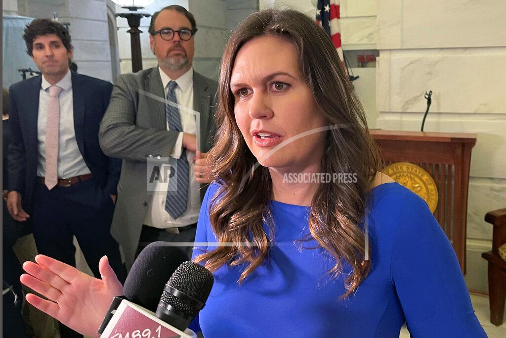 Andrew Demillo FILE - Arkansas Republican Gubernatorial candidate Sarah Sanders talks to reporters at the Arkansas state Capitol in Little Rock, Ark. on Feb. 22, 2022 after filing paperwork to run for governor. She is running in the Republican primary on May 24, 2022. (AP Photo/Andrew DeMillo)