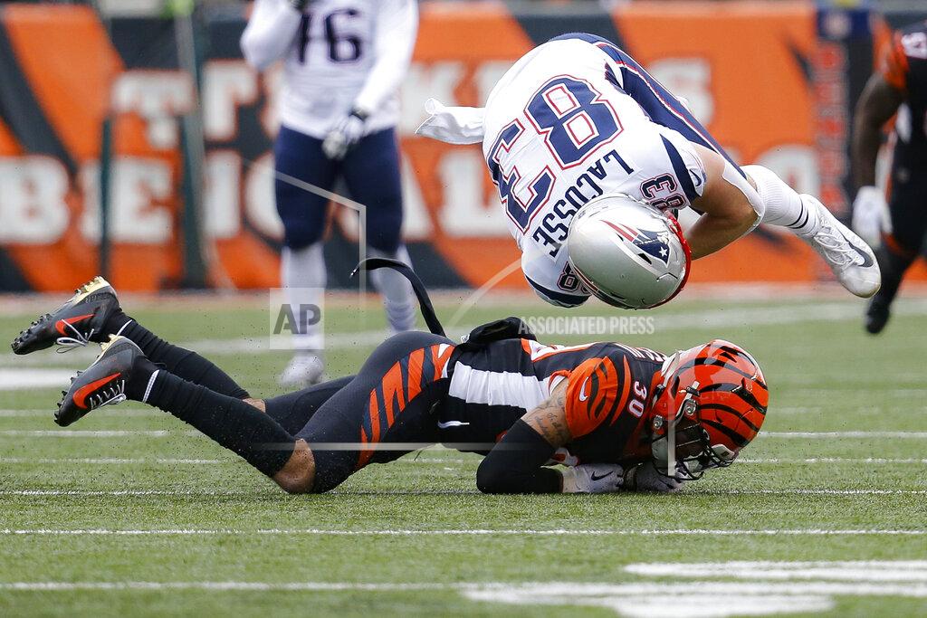 Frank Victores New England Patriots tight end Matt LaCosse (83) is tackled by Cincinnati Bengals free safety Jessie Bates (30) in the first half of an NFL football game, Sunday, Dec. 15, 2019, in Cincinnati. (AP Photo/Frank Victores)