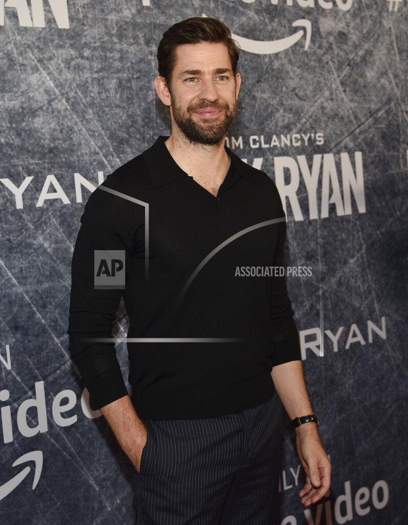 Chris Pizzello FILE - John Krasinski, star of "Tom Clancy's Jack Ryan," poses at the premiere of the television series on Aug. 31, 2018, in Los Angeles. Krasinski is among the entertainers who took the initiative to make the best out of a challenging year. The actor created a YouTube web series, "Some Good News," focusing on positive and inspiring stories. (Photo by Chris Pizzello/Invision/AP, File)