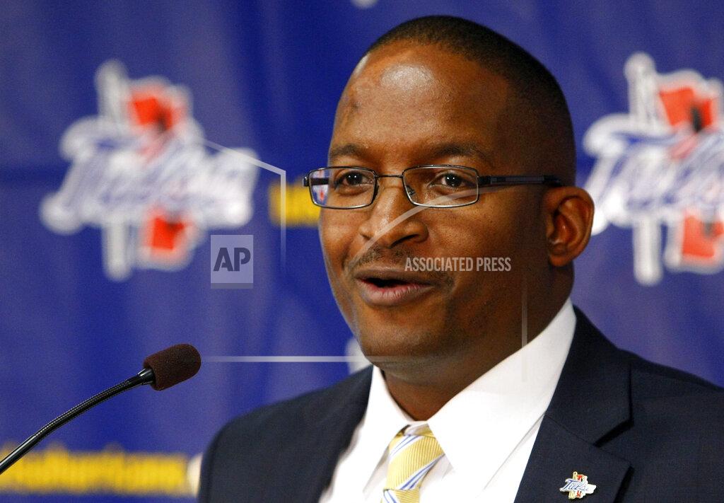 FILE - In this March 22, 2013, file photo, Derrick Gragg speaks to reporters after he was named Tulsa athletic director during a news conference in Tulsa, Oka.. Northwestern hired Gragg as its athletic director on Friday, June 4, 2021, the Big Ten school's second time filling the position in a little more than a month. Mike Polisky, a longtime deputy AD at Northwestern, was promoted to the job May 3 but stepped down amid backlash because he was named in a sexual harassment lawsuit against the school by former Wildcats cheerleaders. (Tom Gilbert/Tulsa World via AP, File)