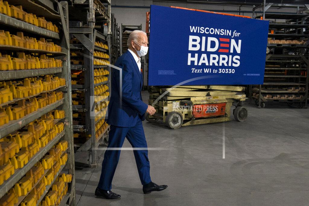 Carolyn Kaster Democratic presidential candidate former Vice President Joe Biden arrives to speak at Wisconsin Aluminum Foundry in Manitowoc, Wis., Monday, Sept. 21, 2020. (AP Photo/Carolyn Kaster)