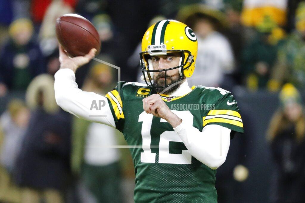 Mike Roemer Green Bay Packers quarterback Aaron Rodgers warms up before an NFL divisional playoff football game against the Seattle Seahawks Sunday, Jan. 12, 2020, in Green Bay, Wis. (AP Photo/Mike Roemer)