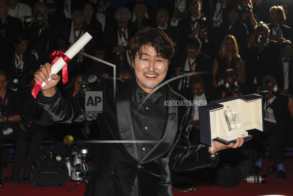 Petros Giannakouris Song Kang-ho, winner of the award for best actor for 'Broker,' poses for photographers during the photo call following the awards ceremony at the 75th international film festival, Cannes, southern France, Saturday, May 28, 2022. (AP Photo/Petros Giannakouris)