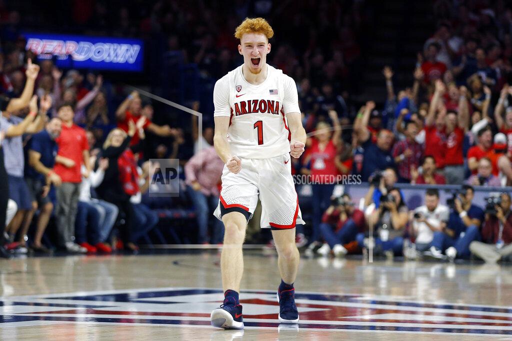 Rick Scuteri Arizona guard Nico Mannion reacts after making a defensive stop against Illinois during the first half of an NCAA college basketball game Sunday, Nov. 10, 2019, in Tucson, Ariz. (AP Photo/Rick Scuteri)