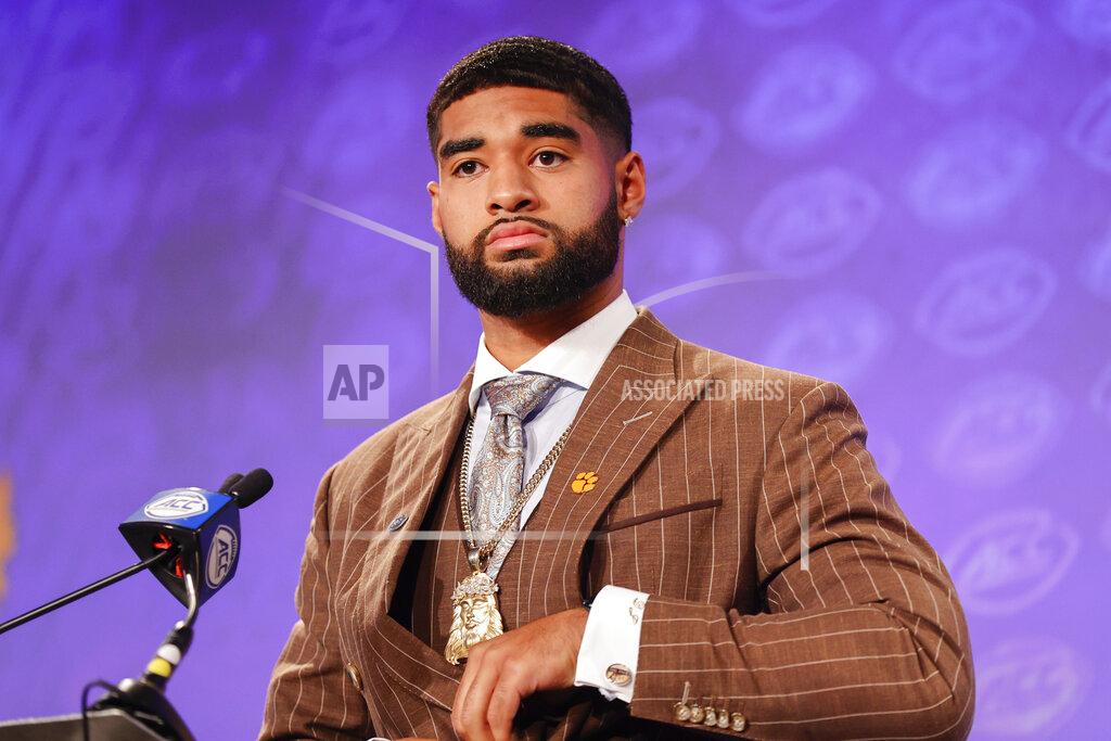 Clemson quarterback DJ Uiagalelei listens to a question during an NCAA college football news conference at the Atlantic Coast Conference Media Days in Charlotte, N.C., Wednesday, July 20, 2022. (AP Photo/Nell Redmond)