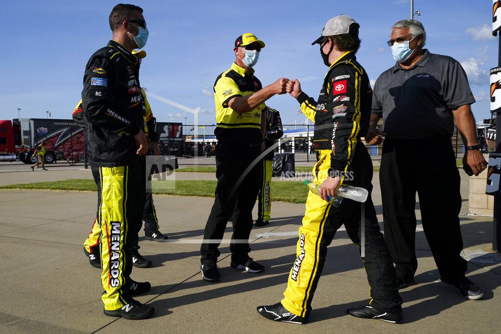 Charlie Riedel Brandon Jones, second from right, is congratulated after winning a NASCAR Xfinity Series auto race at Kansas Speedway in Kansas City, Kan., Saturday, July 25, 2020. (AP Photo/Charlie Riedel)