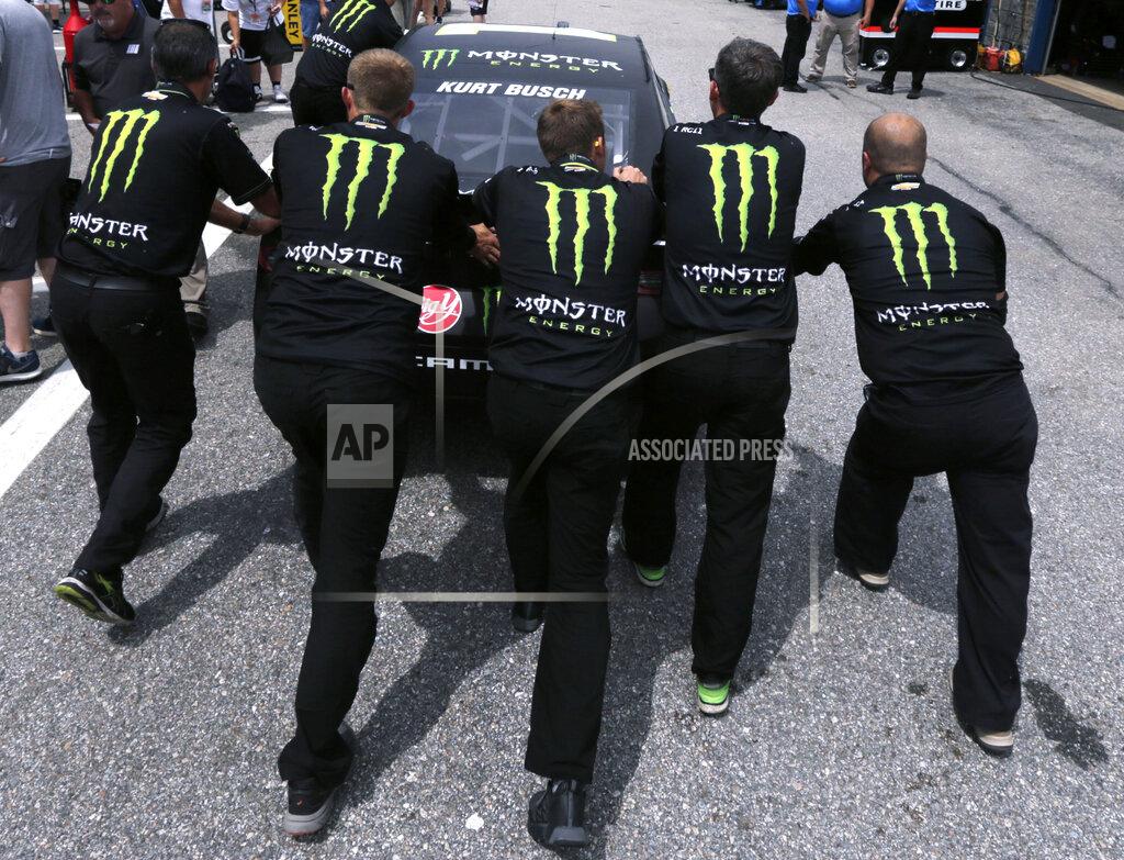 Charles Krupa Kurt Busch's team pushes his car towards inspection prior to a NASCAR Cup Series auto race practice at New Hampshire Motor Speedway in Loudon, N.H., Saturday, July 20, 2019. (AP Photo/Charles Krupa)