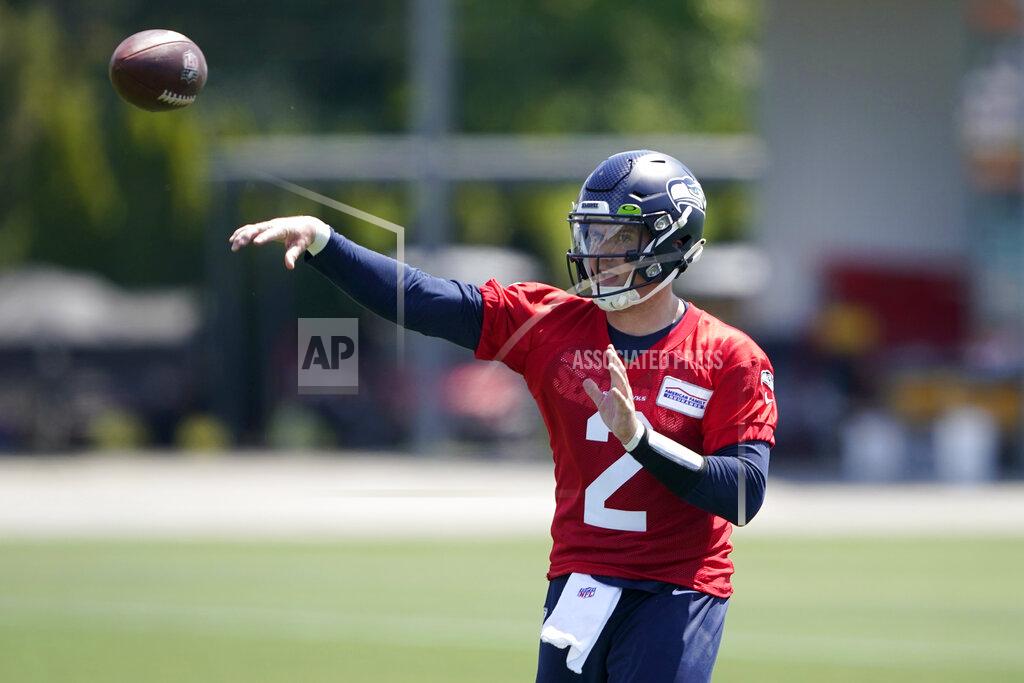 Ted S. Warren Seattle Seahawks quarterback Drew Lock passes during NFL football practice Monday, May 23, 2022, in Renton, Wash. (AP Photo/Ted S. Warren)