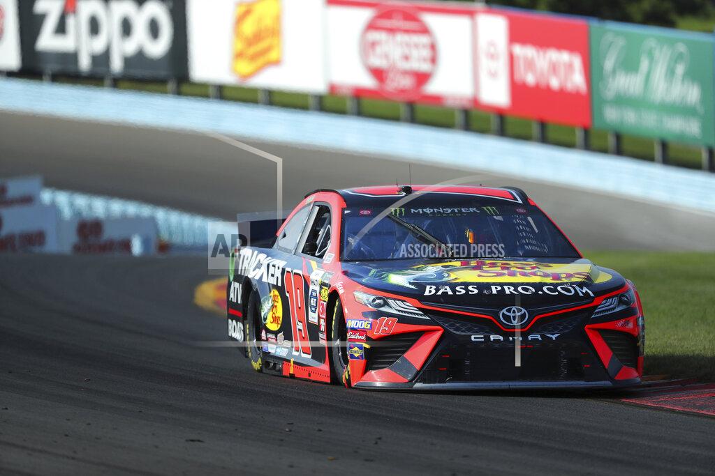 John Munson Martin Truex, Jr., competes in a NASCAR Cup Series auto race at Watkins Glen International, Sunday, Aug. 4, 2019, in Watkins Glen, N.Y. (AP Photo/John Munson)