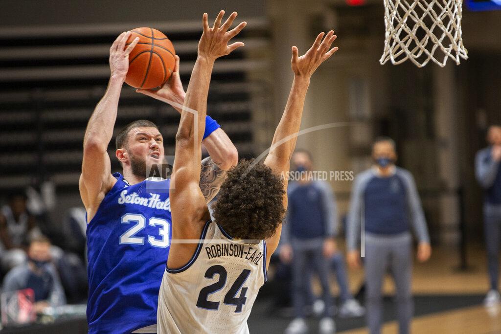 Laurence Kesterson Seton Hall forward Sandro Mamukelashvili (23) shoots over Villanova forward Jeremiah Robinson-Earl (24) during the second half of an NCAA college basketball game Tuesday, Jan. 19, 2021, in Villanova, Pa. Villanova won 76-74. (AP Photo/Laurence Kesterson)