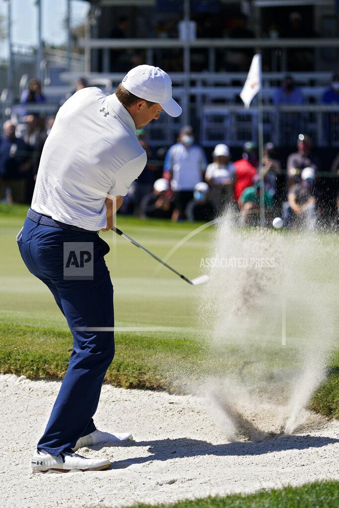 John Raoux Jordan Spieth blasts from a sand trap on the ninth hole during the first round of the Arnold Palmer Invitational golf tournament Thursday, March 4, 2021, in Orlando, Fla. (AP Photo/John Raoux)