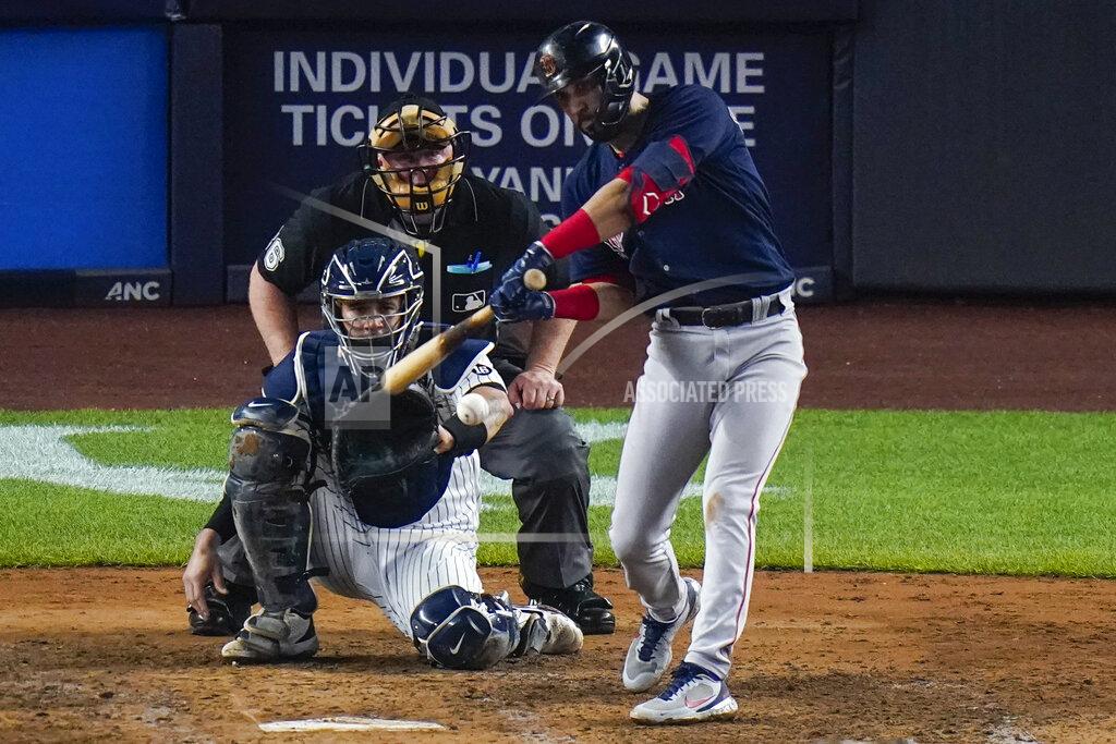 Frank Franklin Ii Boston Red Sox's Marwin Gonzalez, right, hits a two-run double during the sixth inning of a baseball game against the New York Yankees, Friday, June 4, 2021, in New York. (AP Photo/Frank Franklin II)