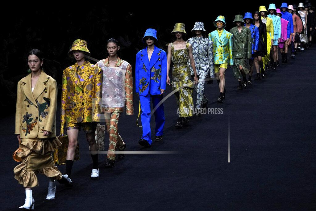 Andy Wong Models present creations by Chinese designer Zheng Wei in her Mackzheng collection during the China Fashion Week in Beijing, Sunday, Sept. 12, 2021. (AP Photo/Andy Wong)