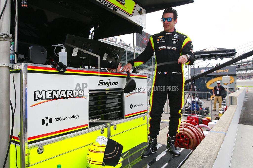 R Brent Smith Simon Pagenaud, of France, stand on the pit wall following the final practice session for the Indianapolis 500 IndyCar auto race at Indianapolis Motor Speedway, Friday, May 24, 2019, in Indianapolis. (AP Photo/R Brent Smith)