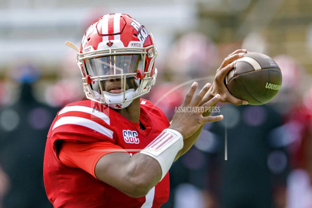 Matthew Hinton FILE - In this Nov. 7, 2020, file photo, Louisiana-Lafayette quarterback Levi Lewis (1) throws during an NCAA football game against Arkansas State in Lafayette, La. Louisiana-Lafayette opens the season against Texas. (AP Photo/Matthew Hinton, File)
