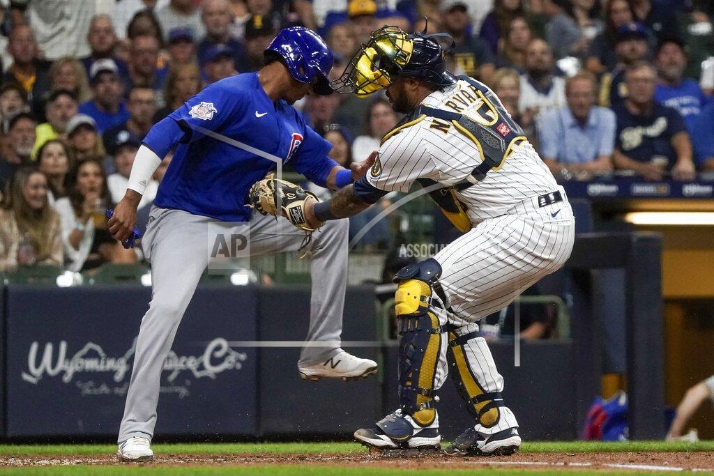 Morry Gash Milwaukee Brewers catcher Omar Narvaez tags out Chicago Cubs' Sergio Alcantara at home during the fourth inning of a baseball game Friday, Sept. 17, 2021, in Milwaukee. Alcantara tried to score from third on a ball hit by Zach Davies. (AP Photo/Morry Gash)