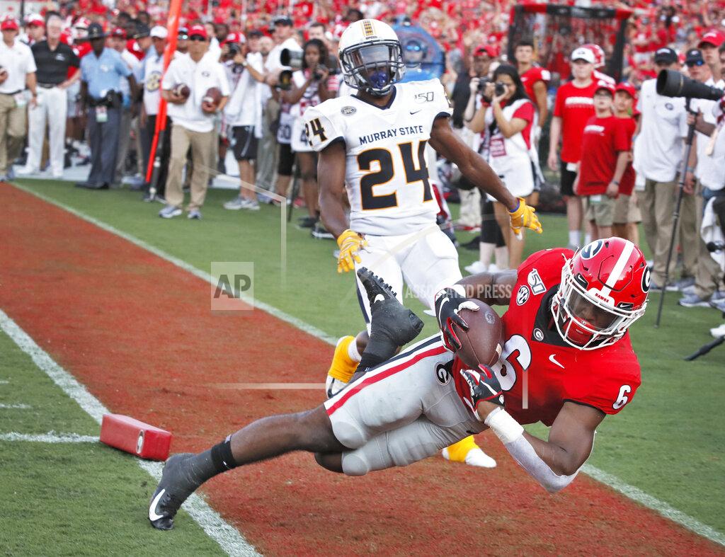 Bob Andres Georgia running back Kenny McIntosh (6) goes into the end zone after a long run, but was ruled out of bounds before scoring, in the second half against Murray State in an NCAA college football game Saturday, Sept. 7, 2019, in Athens, Ga. (Bob Andres/Atlanta Journal Constitution via AP)