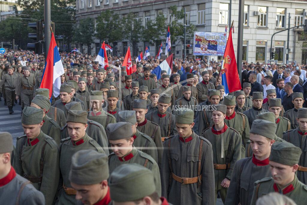 Marko Drobnjakovic Actors dressed in Serbian WWI military uniform replicas during a ceremony to mark the newly established "Day of Serb Unity, Freedom and the National Flag" state holiday in Belgrade, Serbia, Wednesday, Sept. 15, 2021. Serbia has kicked off a new holiday celebrating national unity with a display of military power, triggering unease among its neighbors. (AP Photo/Marko Drobnjakovic)