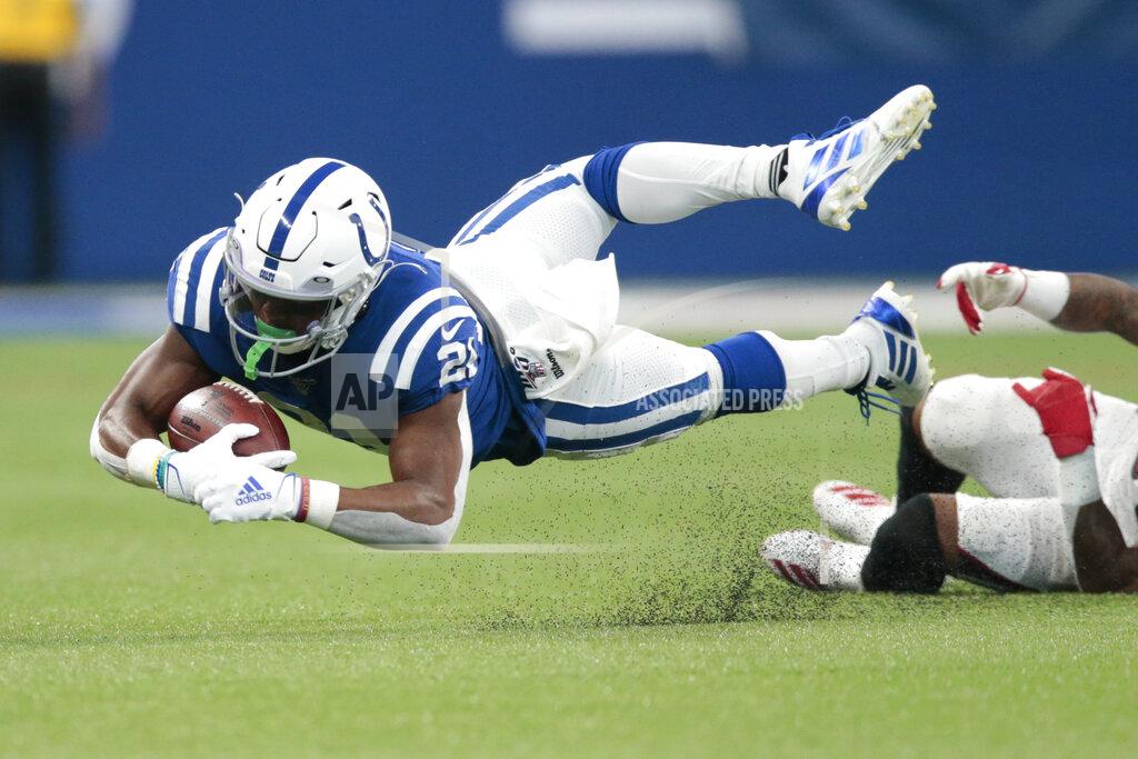 Aj Mast Indianapolis Colts running back Nyheim Hines (21) is tackled by Atlanta Falcons free safety Ricardo Allen (37) during the first half of an NFL football game, Sunday, Sept. 22, 2019, in Indianapolis. (AP Photo/AJ Mast)