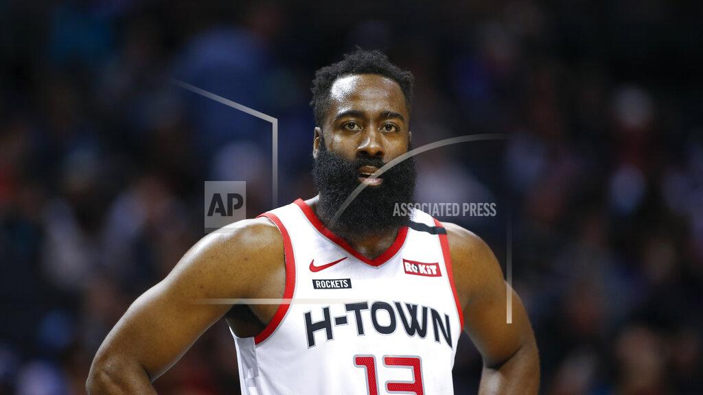 Nell Redmond FILE - In this March 7, 2020, file photo, Houston Rockets guard James Harden stands on the court during a break in the action against the Charlotte Hornets during the second half of an NBA basketball game in Charlotte, N.C. This season’s NBA MVP has won the award before. A trio of past winners of the award — reigning MVP Giannis Antetokounmpo of the Milwaukee Bucks, four-time MVP LeBron James of the Los Angeles Lakers and 2017-18 winner James Harden of the Houston Rockets — were announced Saturday, Aug. 8, 2020, as the finalists for this season’s top NBA individual honor. (AP Photo/Nell Redmond, File)