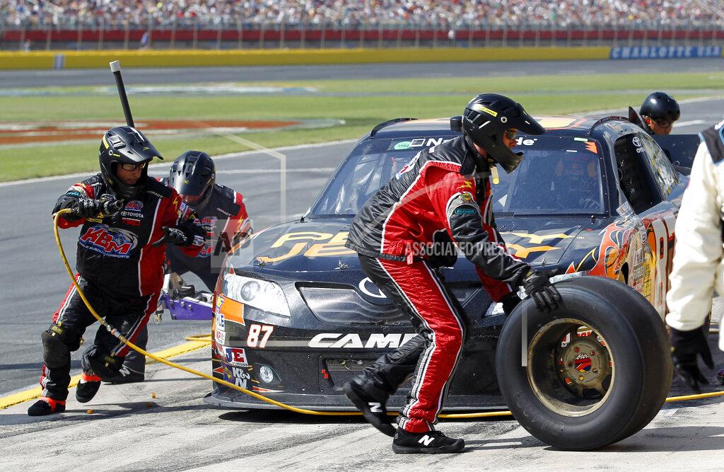 Terry Renna FILE - Kimi Raikkonen, of Finland, makes a pit stop during the NASCAR Nationwide Series auto race May 28, 2011, in Concord, N.C. Raikkonen will take a break from his retirement to return to racing this weekend in the NASCAR race at Watkins Glen. (AP Photo/Terry Renna, File)