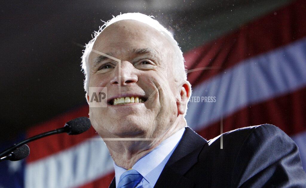 Charles Dharapak FILE - Sen. John McCain, R-Ariz., Republican presidential hopeful, celebrates in Miami after winning the Florida Republican presidential primary, Jan. 29, 2008. President Joe Biden will present the nation’s highest civilian honor, the Presidential Medal of Freedom, to 17 people, at the White House next week. (AP Photo/Charles Dharapak, File)