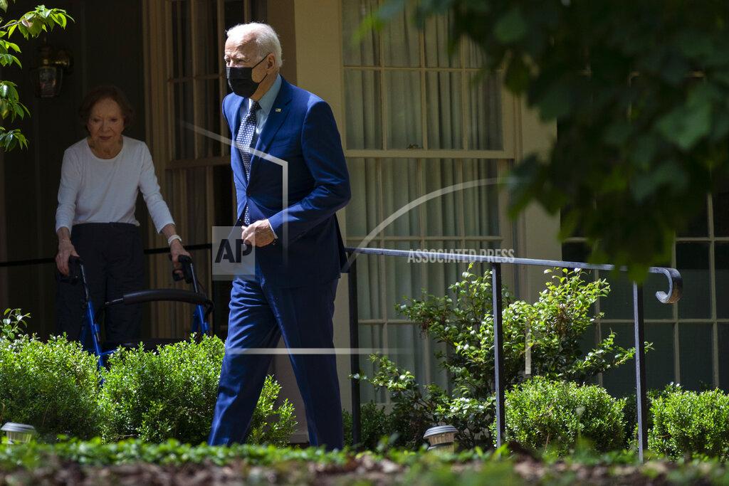 Evan Vucci Former first lady Rosalynn Carter looks on as President Joe Biden leaves the home of former President Jimmy Carter during a trip to mark Biden’s 100th day in office, Thursday, April 29, 2021, in Plains, Ga. (AP Photo/Evan Vucci)