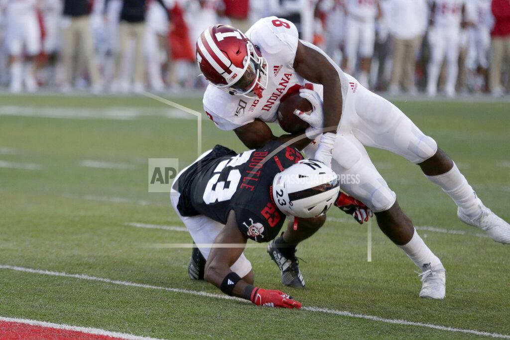 Nati Harnik Indiana running back Stevie Scott III (8) scores a two-point conversion against Nebraska cornerback Dicaprio Bootle (23) during the second half of an NCAA college football game in Lincoln, Neb., Saturday, Oct. 26, 2019. Indiana won 38-31. (AP Photo/Nati Harnik)