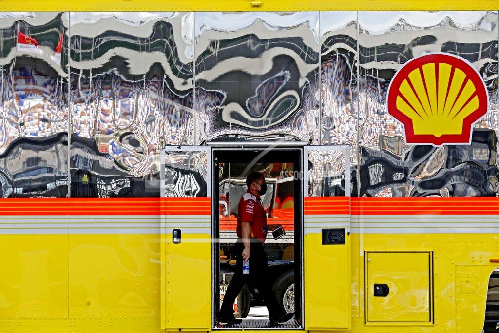 Gerry Broome A crew member walks through the Team Penske truck prior to a NASCAR Cup Series auto race at Charlotte Motor Speedway Sunday, May 24, 2020, in Concord, N.C. (AP Photo/Gerry Broome)