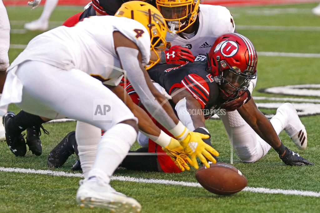 Rick Bowmer Arizona State defensive back Evan Fields (4) picks up the fumble from Utah running back Zack Moss (2) during the first half of an NCAA college football game Saturday, Oct. 19, 2019, in Salt Lake City. (AP Photo/Rick Bowmer)