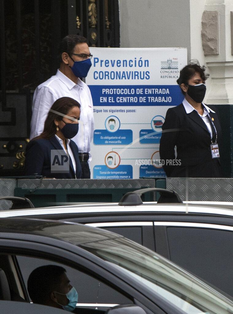 Rodrigo Abd Peru's President Martin Vizcarra, top left, leaves Congress after addressing lawmakers in Lima, Peru, Friday, Sept. 18, 2020. Vizcarra’s job is on the line Friday as opposition lawmakers push through an impeachment hearing criticized as a hasty and poorly timed ouster attempt in one of the countries hardest hit by the coronavirus pandemic. (AP Photo/Rodrigo Abd)
