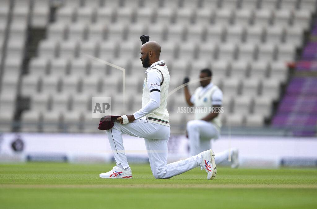 Mike Hewitt West Indies' Roston Chase takes a knee on the first day of the 1st cricket Test match between England and West Indies, at the Ageas Bowl in Southampton, England, Wednesday July 8, 2020. (Mike Hewitt/Pool via AP)