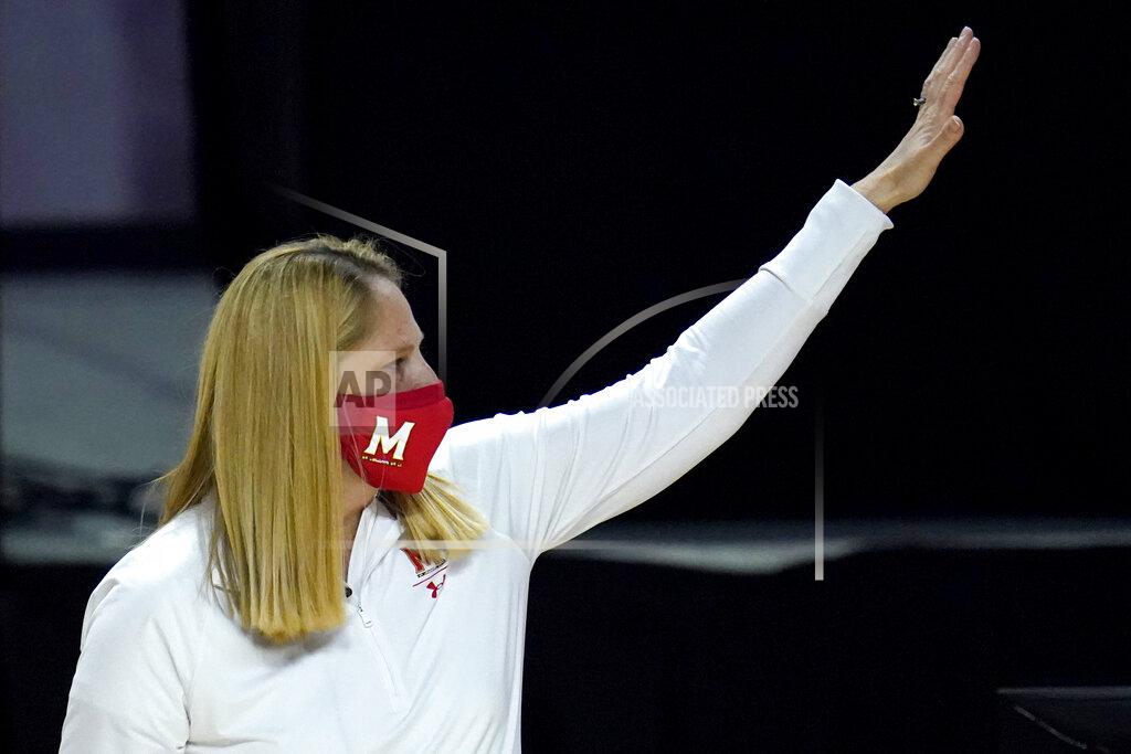 Julio Cortez Maryland head coach Brenda Frese gestures toward the Wisconsin bench after an NCAA college basketball game, Thursday, Feb. 4, 2021, in College Park, Md. Frese tied a school record with her 499th win, reaching the milestone by guiding the 10th-ranked Terrapins past Wisconsin 84-48. Frese matched the mark set by Hall of Fame coach Chris Weller, who was at Maryland from 1975-2002. Weller was replaced by Frese, who's 499-130 over 19 seasons. (AP Photo/Julio Cortez)