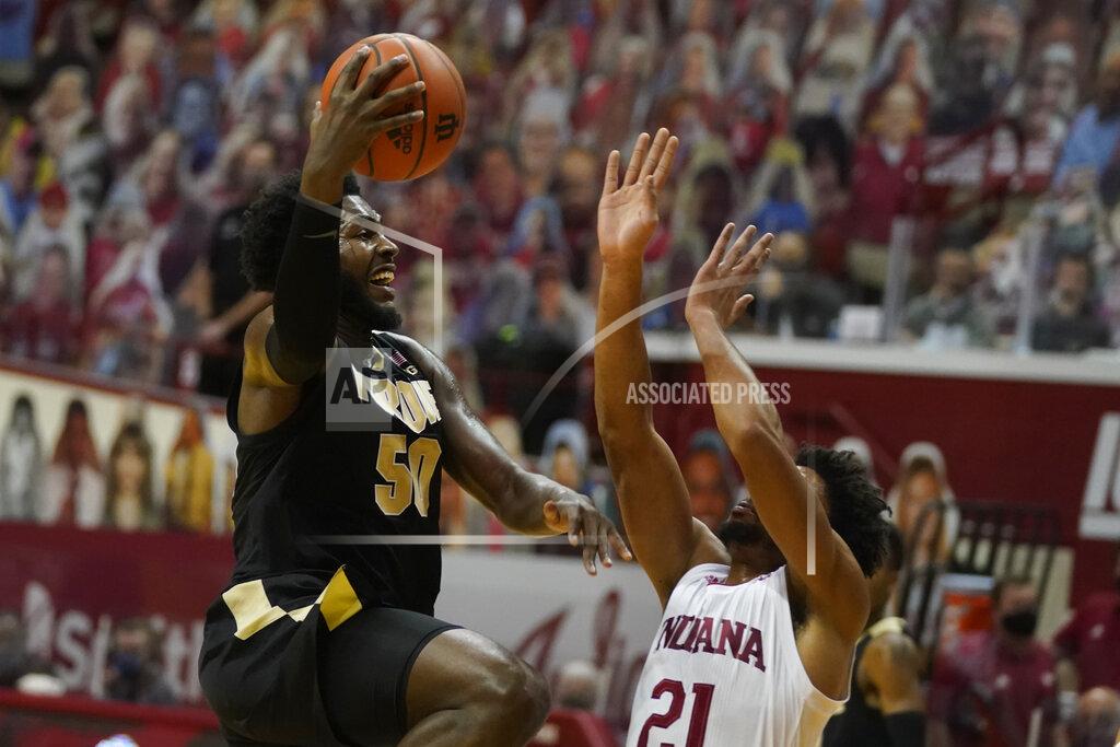 Darron Cummings Purdue's Trevion Williams (50) goes to the basket against Indiana's Jerome Hunter (21) during the first half of an NCAA college basketball game, Thursday, Jan. 14, 2021, in Bloomington Ind. (AP Photo/Darron Cummings)