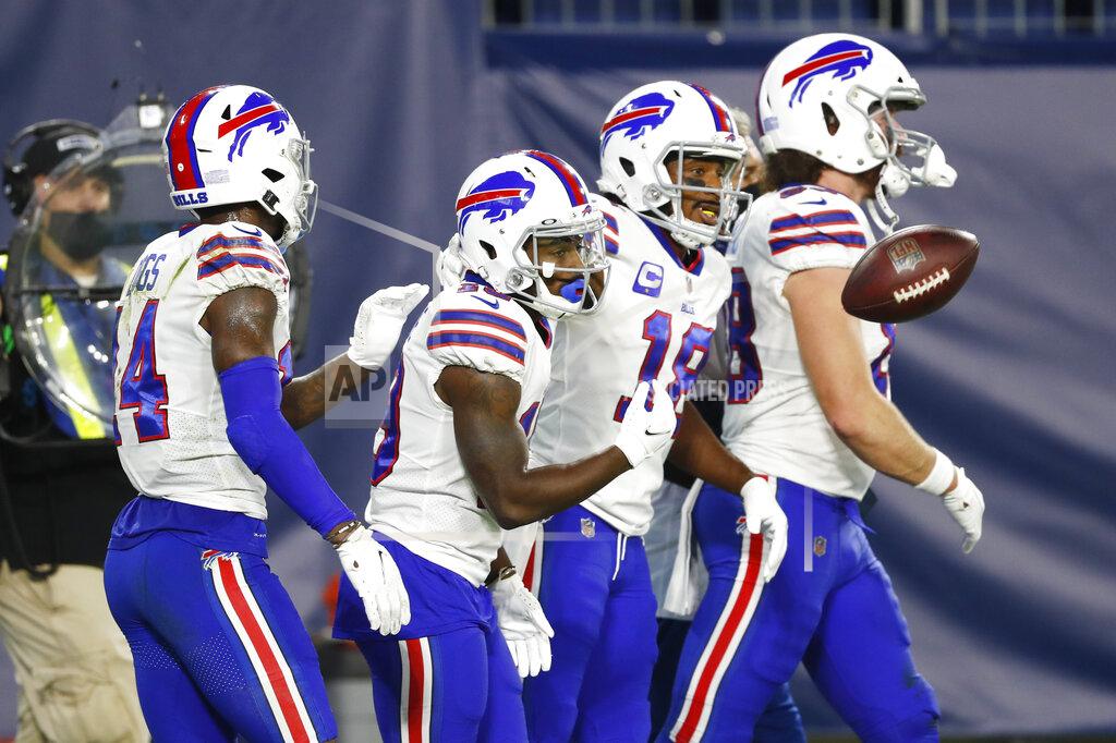 Wade Payne Buffalo Bills wide receiver Isaiah McKenzie, second from left, is congratulated after catching a touchdown pass against the Tennessee Titans in the first half of an NFL football game Tuesday, Oct. 13, 2020, in Nashville, Tenn. (AP Photo/Wade Payne)