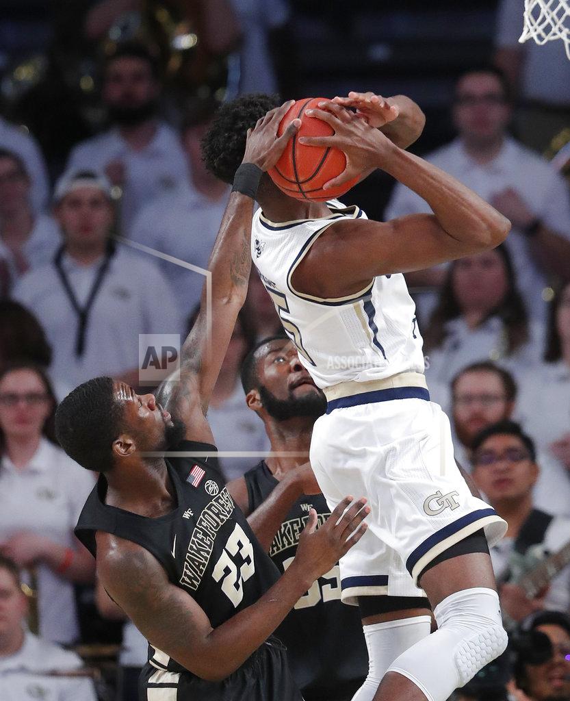 John Bazemore Georgia Tech forward Moses Wright (5) has his shot blocked by Wake Forest guard Chaundee Brown (23) during the first half of an NCAA college basketball game, Saturday, Jan. 5, 2019, in Atlanta. (AP Photo/John Bazemore)