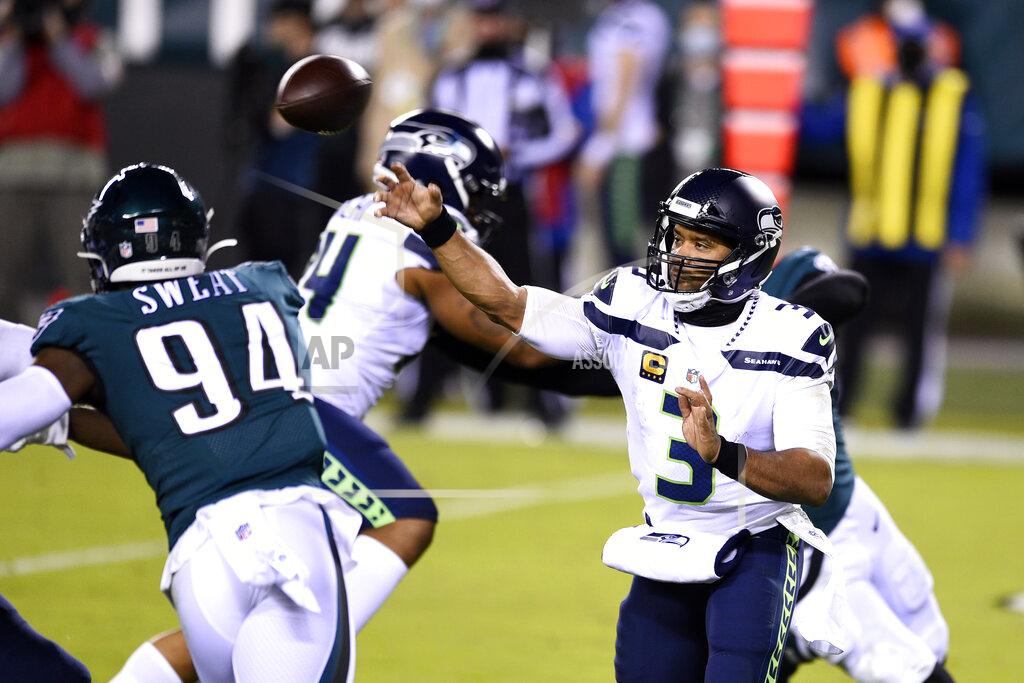 Derik Hamilton Seattle Seahawks' Russell Wilson passes during the first half of an NFL football game against the Philadelphia Eagles, Monday, Nov. 30, 2020, in Philadelphia. (AP Photo/Derik Hamilton)